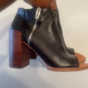 Dolce Vita peep toe ankle booty with chunky heel.